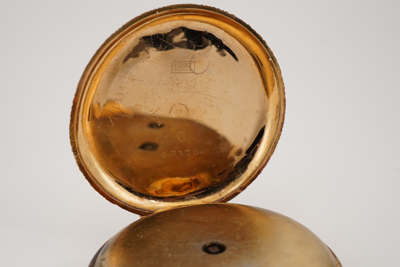 A lady's early 20th century Swiss 18k open faced key wind fob watch